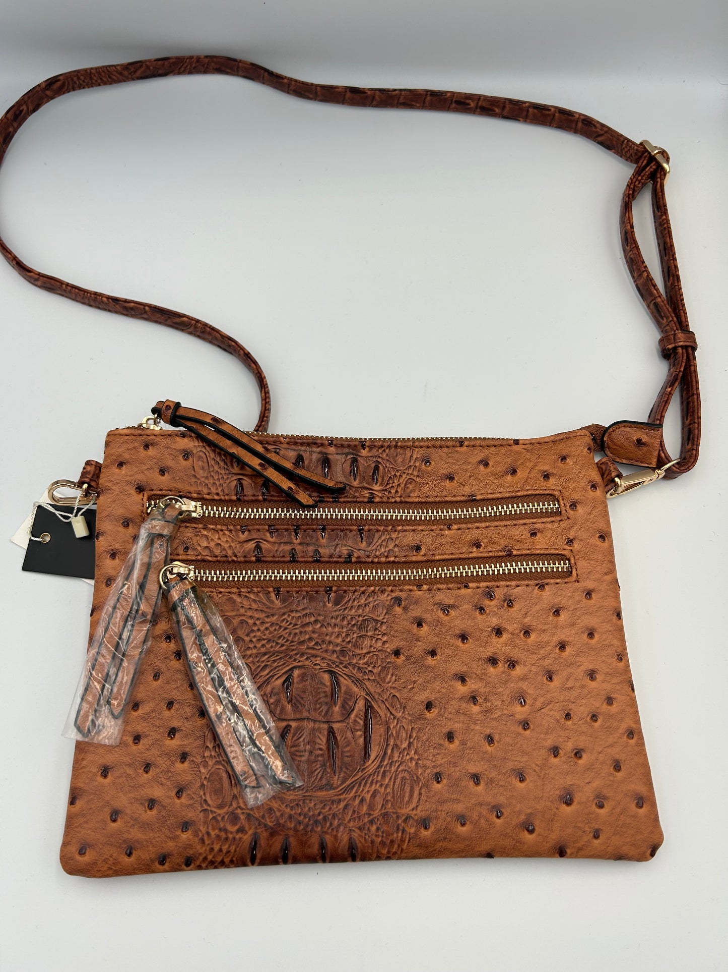 Koníaks brún crossbody taska